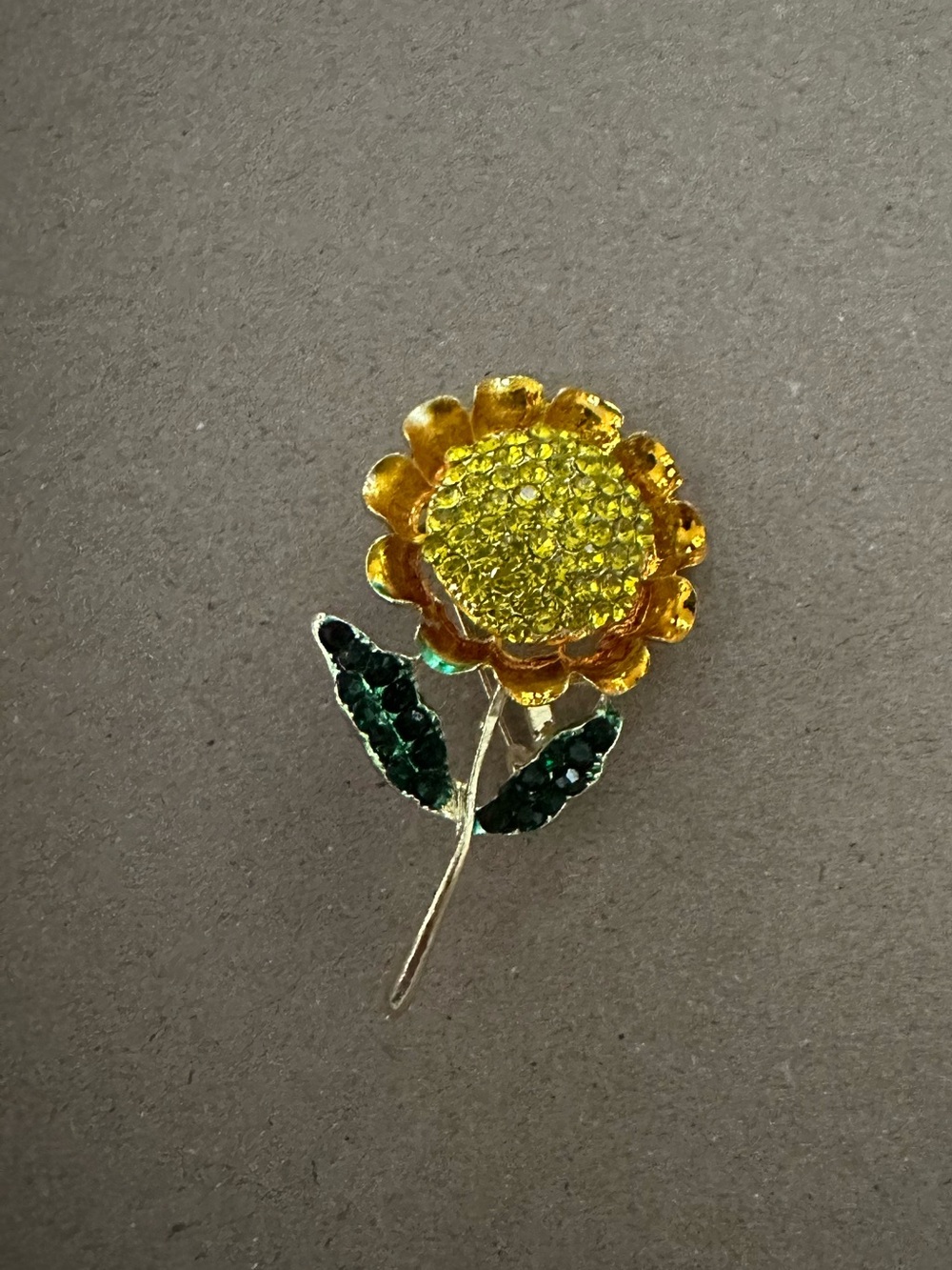 Gold Sunflower Brooch with Yellow Center and Green Leaves
